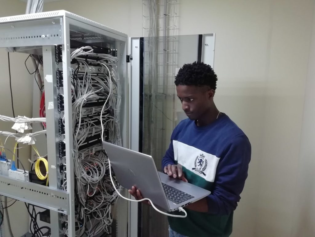 man working in server